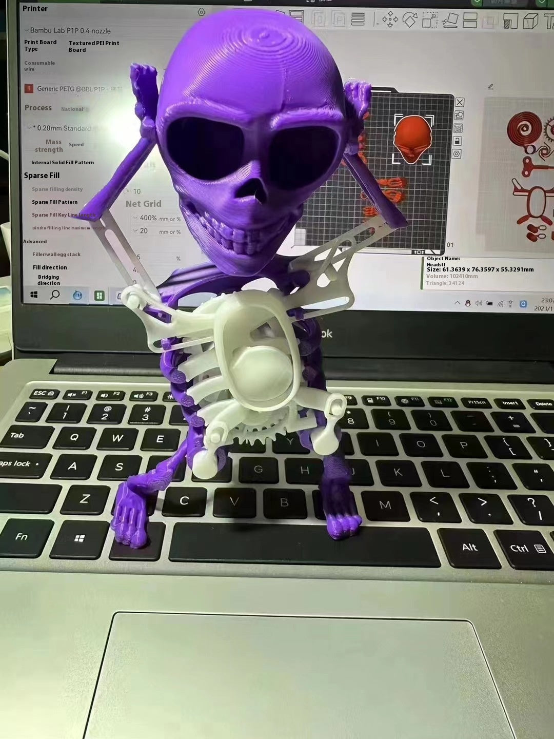 Skeleton man dancing and swinging clockwork 3D printed fun toy